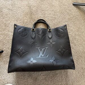 Louis Vuitton on the go tote black GM